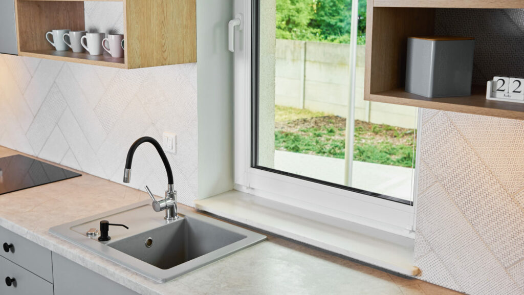 interior of a modern kitchen with sink and window 2022 12 16 12 50 55 utc 1.jpg