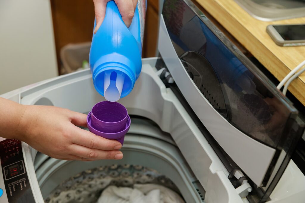 how to clean a washing machine cap loader