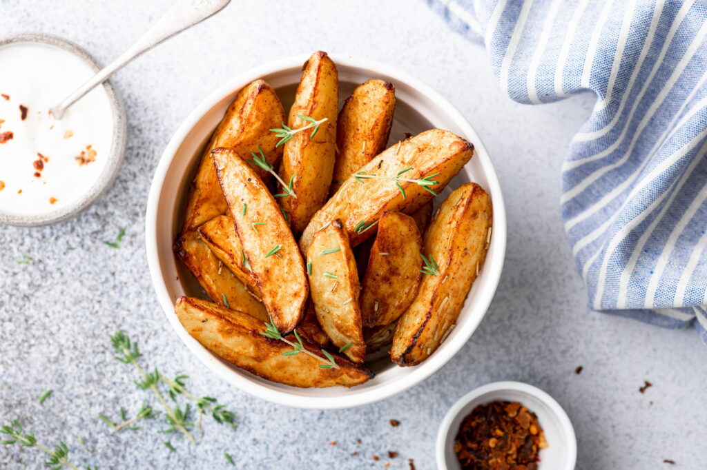 How Microwave a Potato - baked potato wedges with sauce
