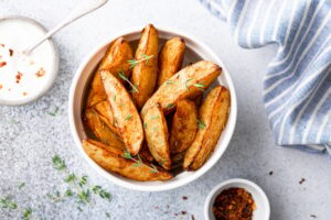 How Microwave a Potato - baked potato wedges with sauce