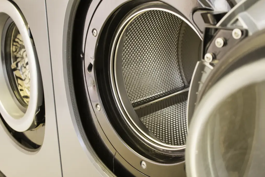 washing machine close up with open door 2026 03 25 22 54 35 utc